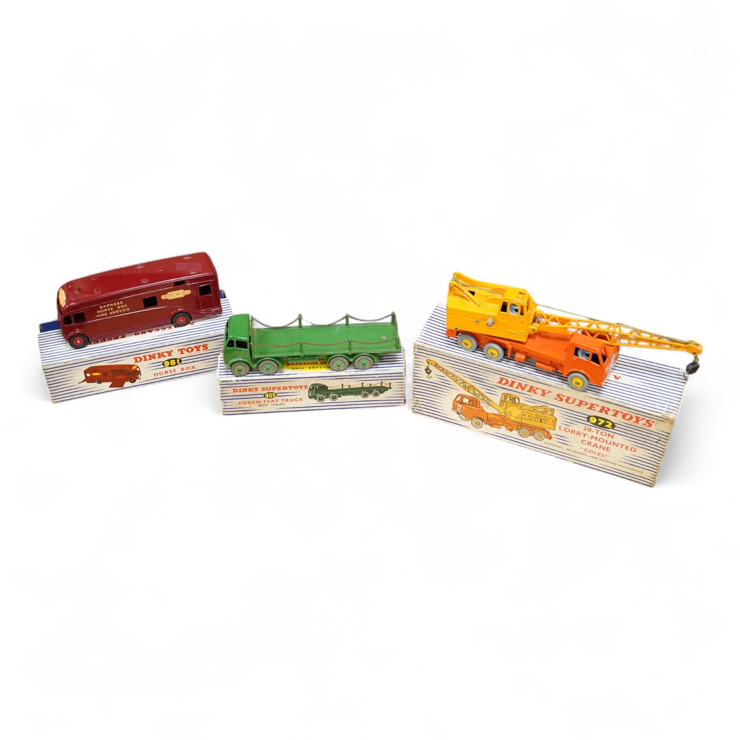 Three boxed Dinky Toys and Supertoys; a Foden FG with chains in green (905), Horse Box in BR livery (981), and a 20-ton Lorry-Mounted Coles Crane (972)